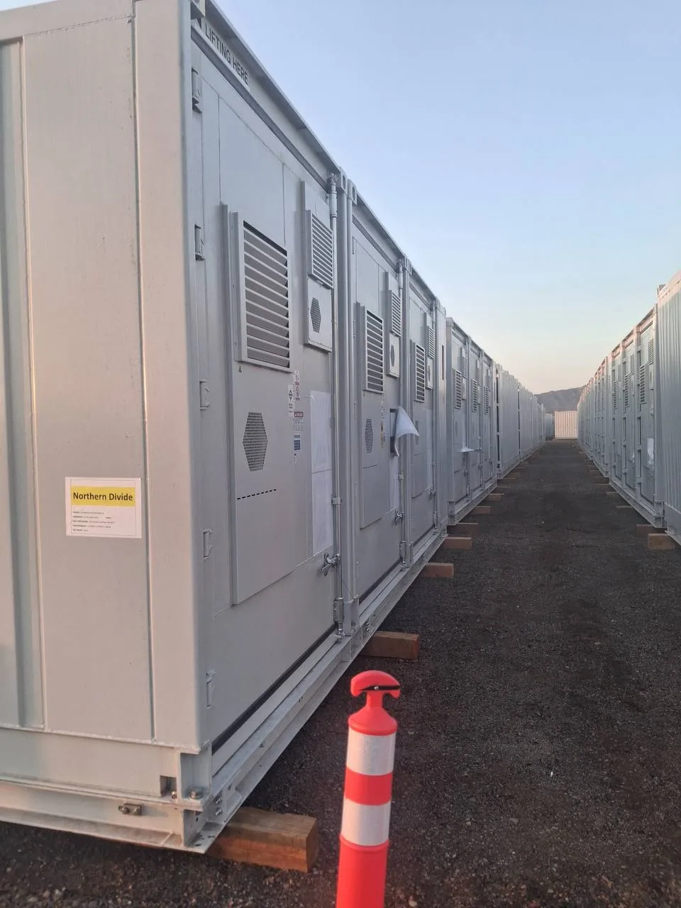 Delivered battery energy storage containers with identification labels, spec documentation and lifting-point markings